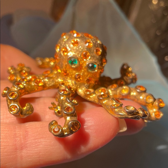 Vintage Gold Tone Octopus Brooch: Rhinestone Crystal Accent  Vintage Gold-Tone Octopus Brooch with Amber Crystals and Green Eyes